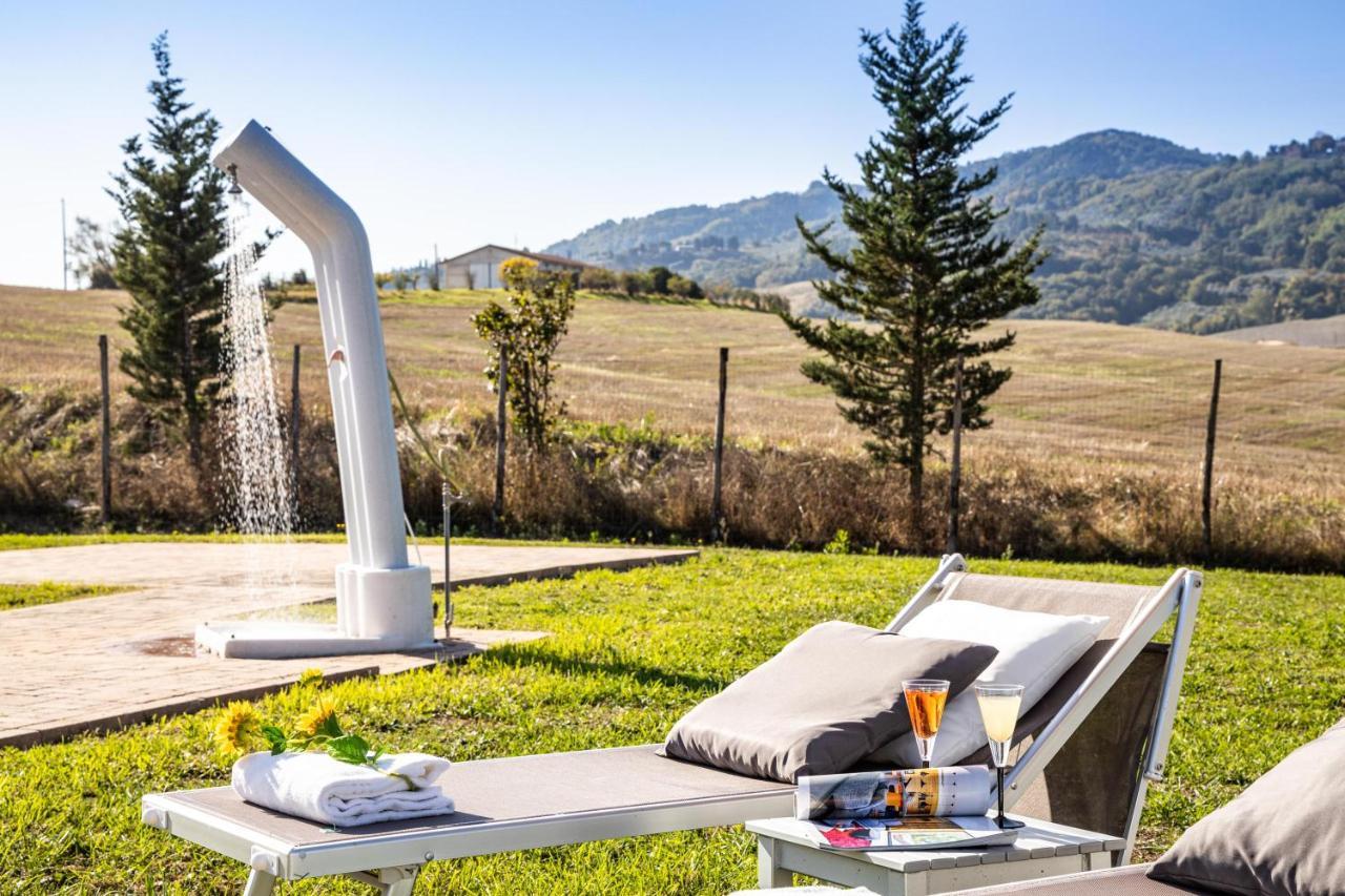 Appartamento in casale con piscina Casa I Pavoni Chianni Esterno foto