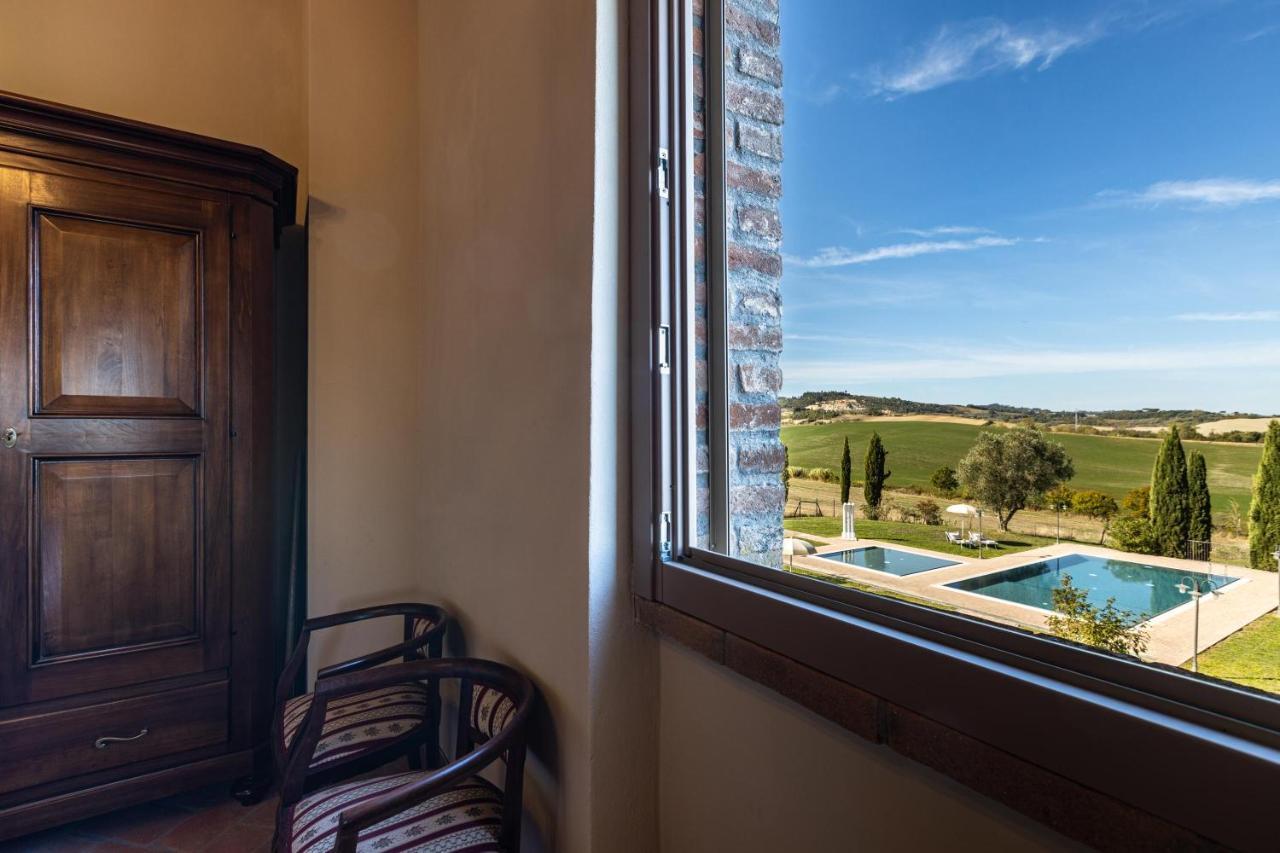 Appartamento in casale con piscina Casa I Pavoni Chianni Esterno foto