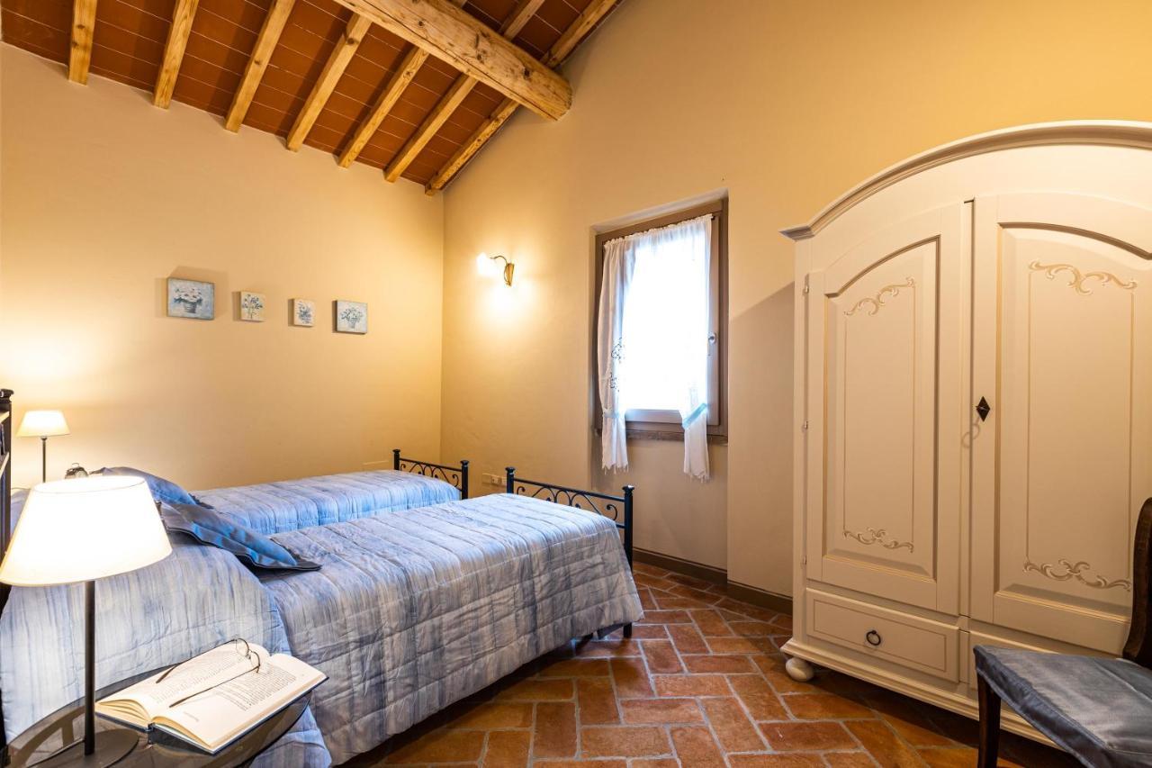 Appartamento in casale con piscina Casa I Pavoni Chianni Esterno foto
