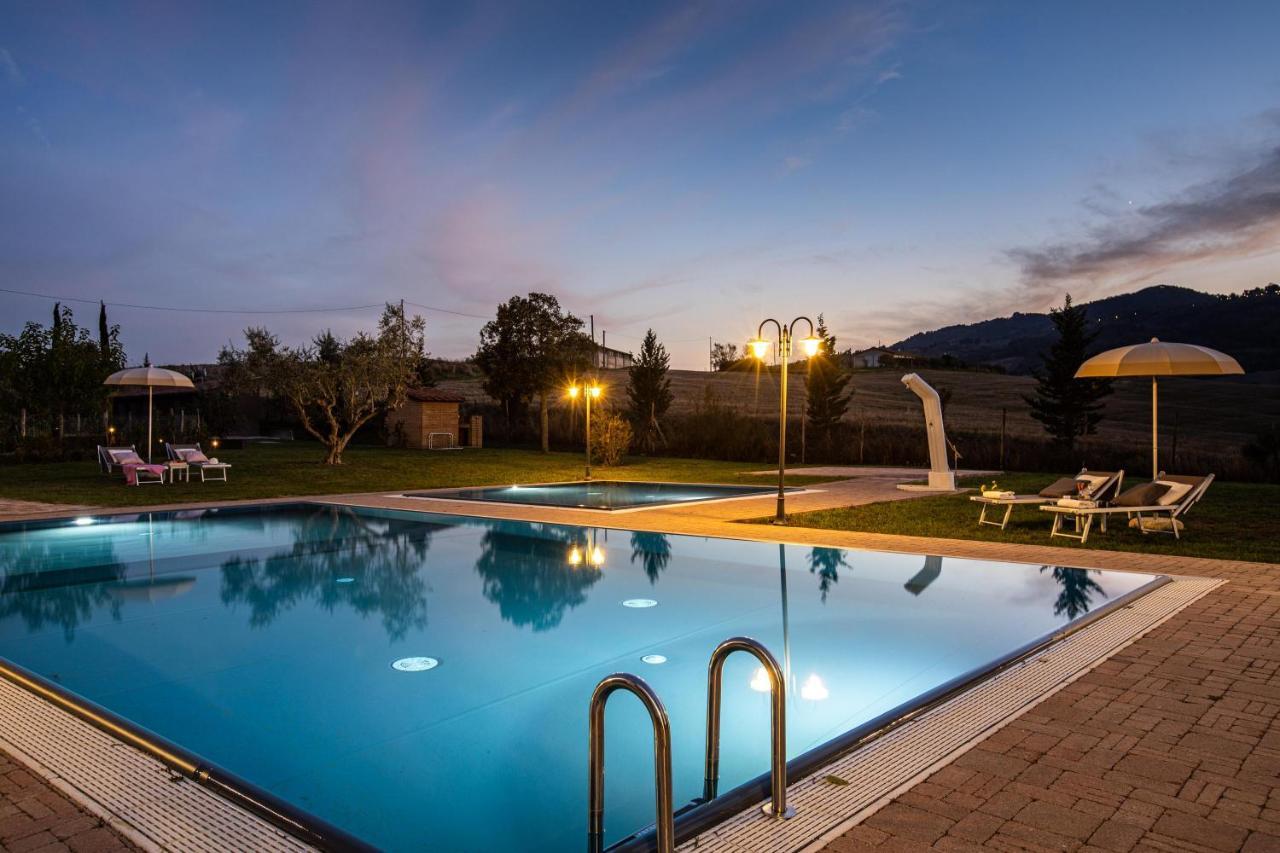 Appartamento in casale con piscina Casa I Pavoni Chianni Esterno foto