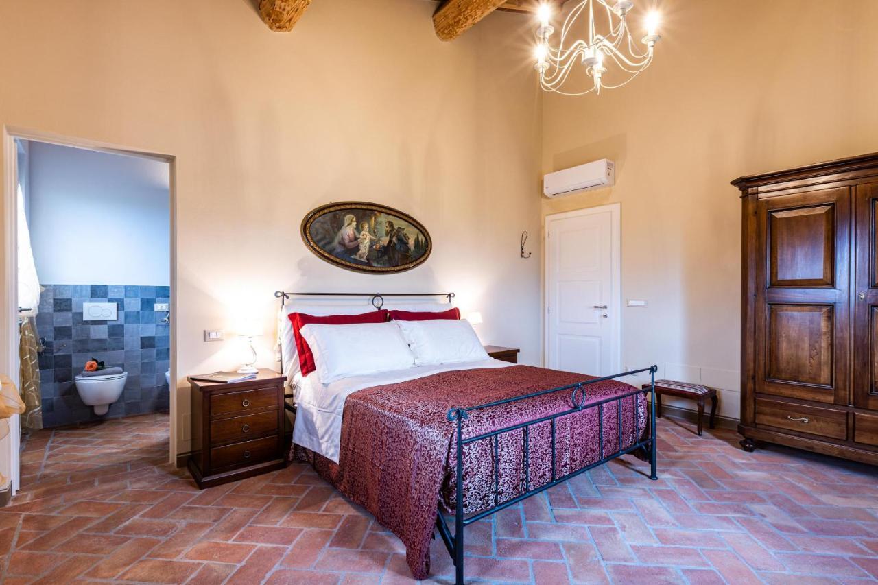 Appartamento in casale con piscina Casa I Pavoni Chianni Esterno foto