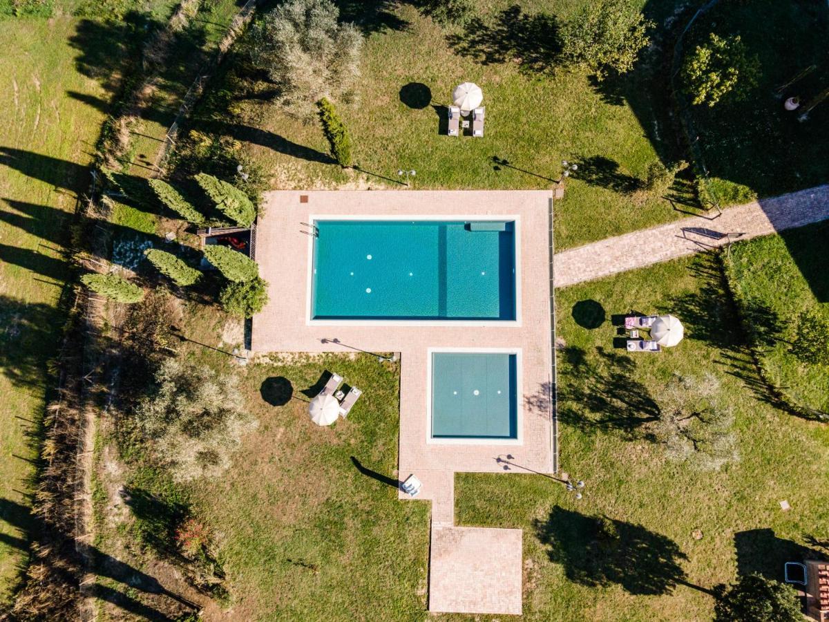 Appartamento in casale con piscina Casa I Pavoni Chianni Esterno foto