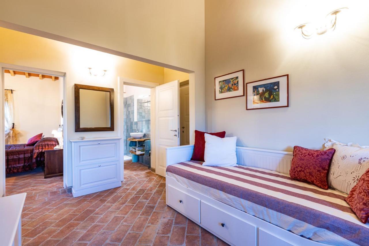 Appartamento in casale con piscina Casa I Pavoni Chianni Esterno foto