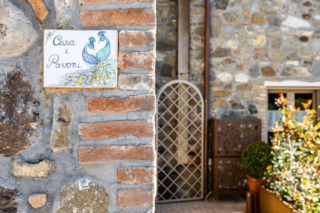 Appartamento in casale con piscina Casa I Pavoni Chianni Esterno foto