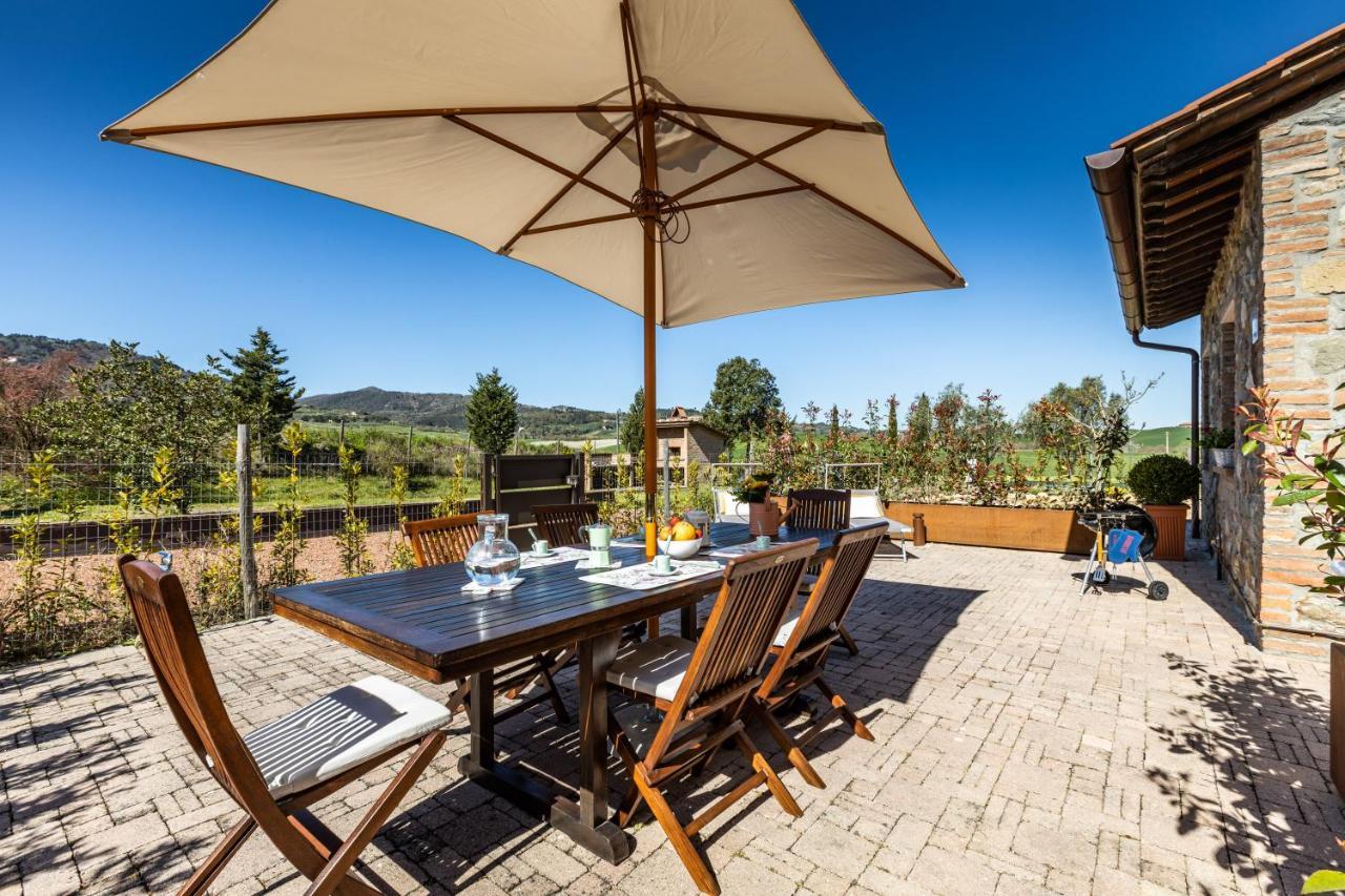 Appartamento in casale con piscina Casa I Pavoni Chianni Esterno foto